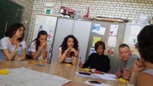 Volunteer preparing activities for the center Photo