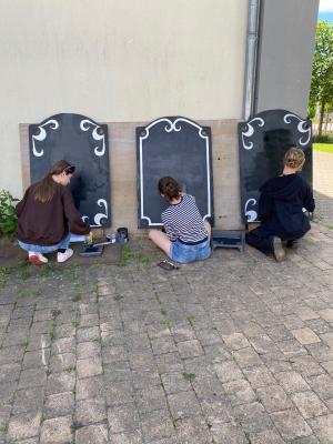 Volunteers preparing props for the festival Photo